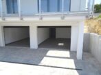 Neubauwohnung, 100% barrierefrei, Terrasse, exkl. Ausstattung, EBK, Garage und Lift! - Garagenzufahrt
